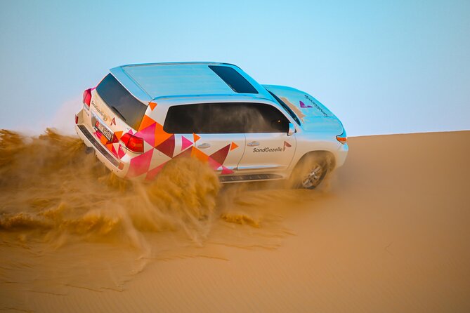 Abu Dhabi Evening Desert Safari - Private car Dune bashing & BBQ - Camel farm visit: a calmer pause that adds meaning