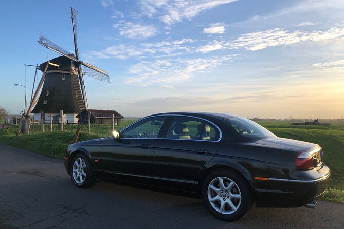 Amsterdam in a Nutshell 4 Hour Private Car Tour and Amsterdam Born Private Guide - Pickup, timing, and the mobile ticket setup