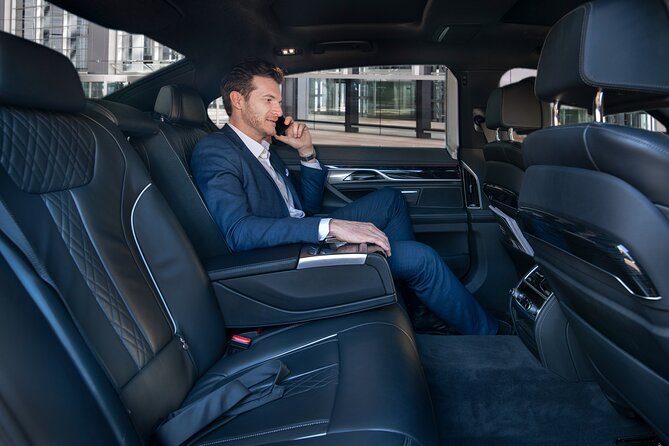Brisbane Ultimate Chauffeur Airport Departure experience - The Booking Signals: Email Confirmation, 30-Minute SMS, and GPS