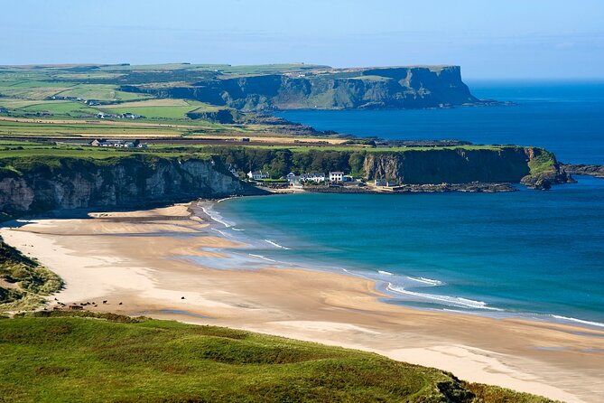 Chauffeur Giants Causeway & Belfast Private Day Tour From Dublin - Dunluce Castle photo stop: quick coastal drama before Belfast