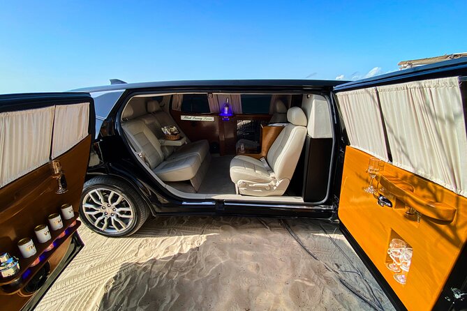 Deluxe GMC Limousine from CUN Airport to Playa Mujeres - How the airport pickup works at Cancun International (including terminal-specific spots)