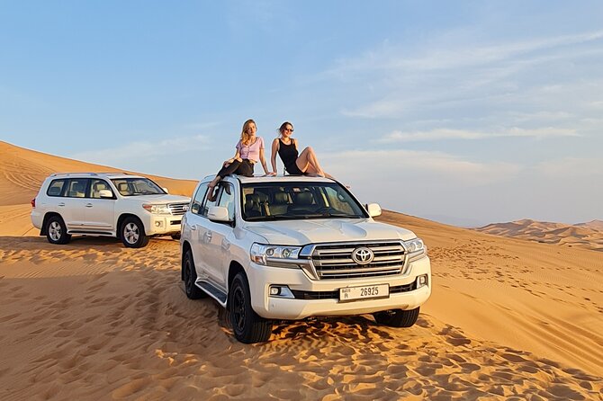 Dubai Desert Safari & Buffet Dinner and Camel ride with PRIVATE CAR - Entertainment Schedule: Belly Dance, Tanura, and Fire Show