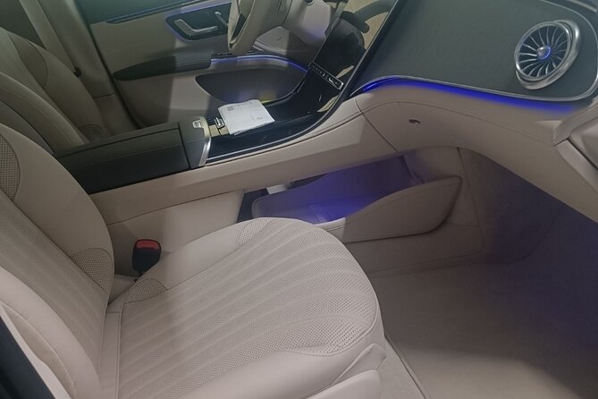 Exclusive green transfer - Electric Mercedes limo vibes, minus the limo fuss