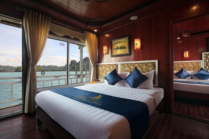 From Hanoi: 2D1N Ha Long Bay Deluxe Cruise with Bus Limousine - Titop Island: Beach Time Plus the View That Makes the Climb Worth It