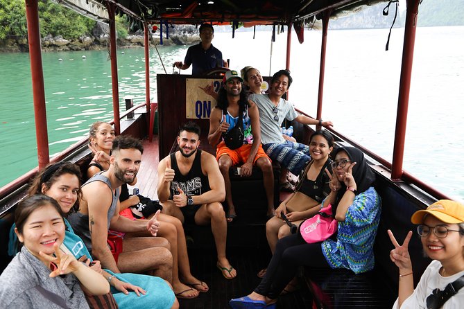 From Hanoi: 2D1N Ha Long Bay Deluxe Cruise with Bus Limousine - Pearl Farm, Kayaking, and Spring Rolls: The Hands-On Pieces