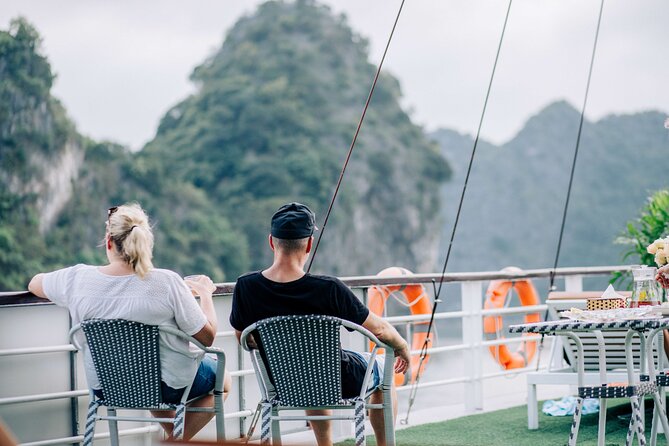 Full-Day Halong Bay Cruise with Limousine Pickup - Hang Luon Cave: Kayaking Option or Rowboat Ride
