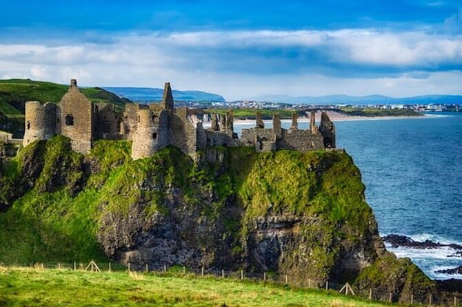 Giants Causeway and Belfast 2 Days with Private Chauffeur Tour - Dunluce Castle ruins: a cliff-top stop that feels like a movie set