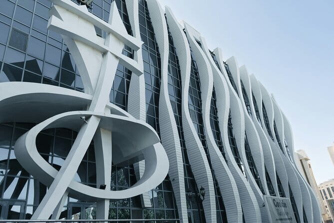 Guided Night Time Tour of Astana in a Private Car - Atyrau Bridge: the sturgeon fish detail you’ll want to remember