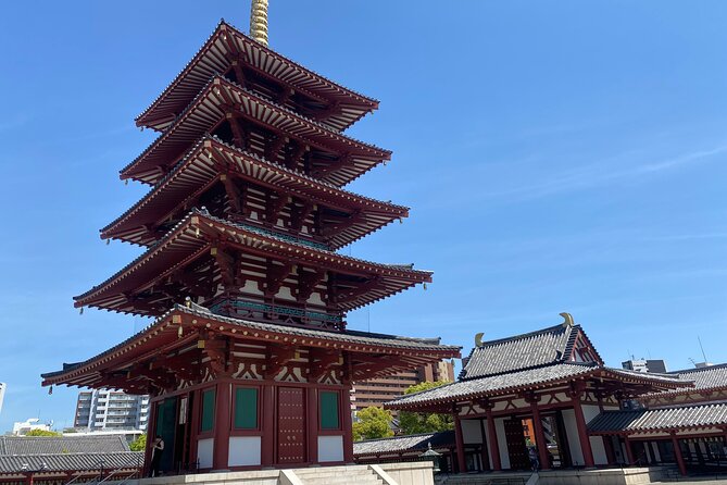 Guided Tour of Some Attractions in Osaka by Private Car - Shinsekai: old-world Osaka streets for games, food, and style