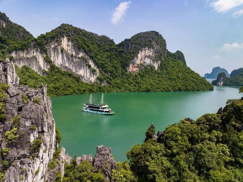 Ha Long Bay Cruise w/ Jacuzzi, Kayak & Limo from Hanoi - Thien Cung Cave, Monkey Island, and a fishing village: the human side of Ha Long Bay