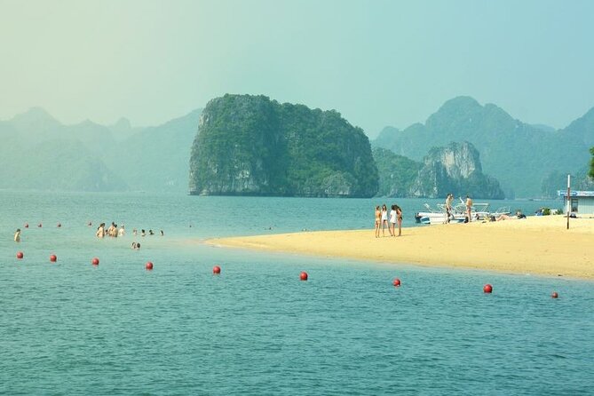 Halong Bay Day Tour 6Hour Deluxe Cruise Limousine Bus Small Group - Hang Luon Cave: kayaking or bamboo boat through a water-cave feel