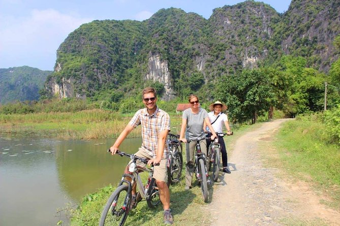 Hoa Lu - Tam Coc Luxury Small group 1D: Limousine bus, biking, boat trip, Lunch - Bamboo Boat Through Hang Ca, Hang Hai, Hang Ba