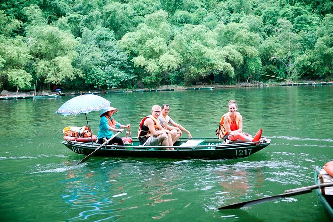 Hoa Lu - Tam Coc Luxury Small group 1D: Limousine bus, biking, boat trip, Lunch - Hoa Lu Temples: Visiting the Ancient Capital of Dinh and Le