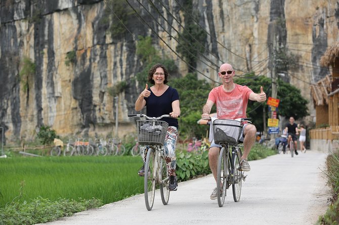 Hoa Lu - Tam Coc Luxury Small group 1D: Limousine bus, biking, boat trip, Lunch - Cycling Through Ninh Hai Village: Rice Paddies, Narrow Trails, and Embroidery