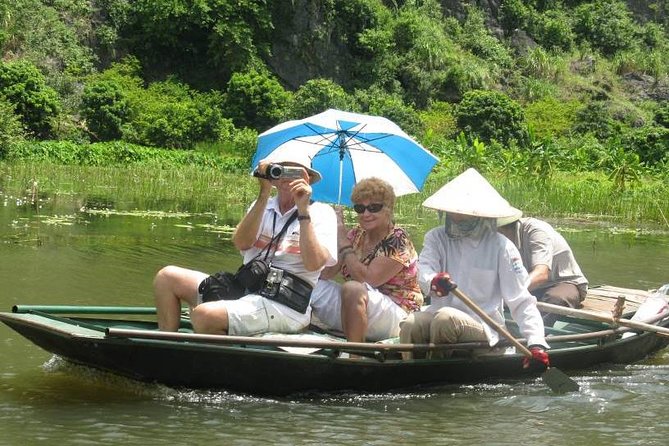 Hoa Lu - Tam Coc - Mua Cave day trip - Luxury limousine from Hanoi - Tam Coc Sampan Ride: The Ngo Dong River and Three Caves