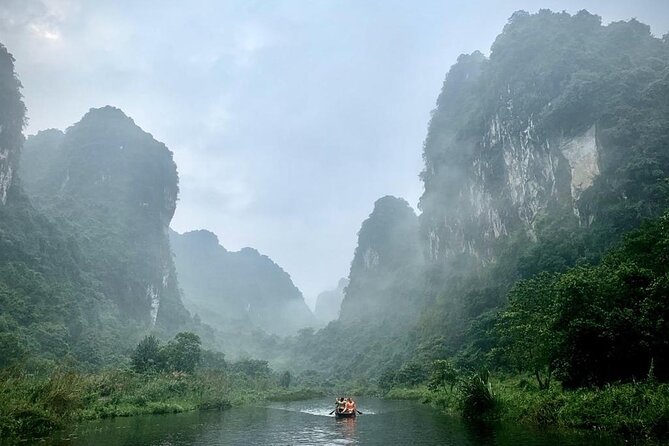 Hoa Lu - Tam Coc - Mua Cave Full Day - LIMOUSINE - Tam Coc bamboo boat on the Ngo Dong River: why it feels like Ha Long on land