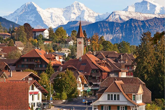 Interlaken: Private Car Tour to Swiss Villages, Capital & Castles - Spiez and Thun: medieval castle silhouettes over Lake Thun