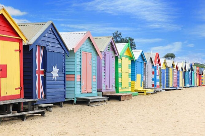 Melbourne Landmark City Tour. Your day Your way Your private tour - Brighton Beach photo stop: bathing boxes with skyline backdrop