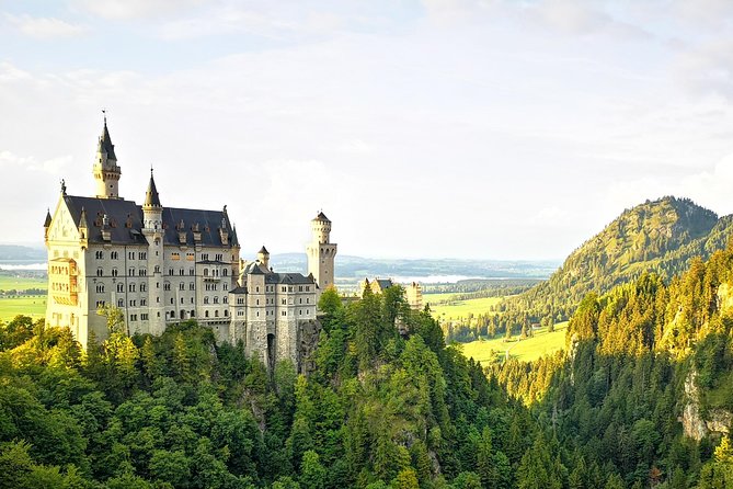 Munich private Car & Walking Tour incl. BMW World & River Surfers - Starting in Munich: BMW World and River Surfers before the Alps