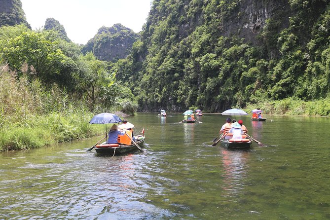 Ninh Binh Luxury Tour 2 Days 1 night by limousine See Hidden Gems - Tam Coc bamboo boat ride: caves, paddies, and a slower pace