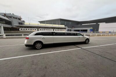 NYC VIP Private Luxury airport arrival ride by Stretch Limousine - Vehicle choice: sedan, SUV, van, or stretch limo