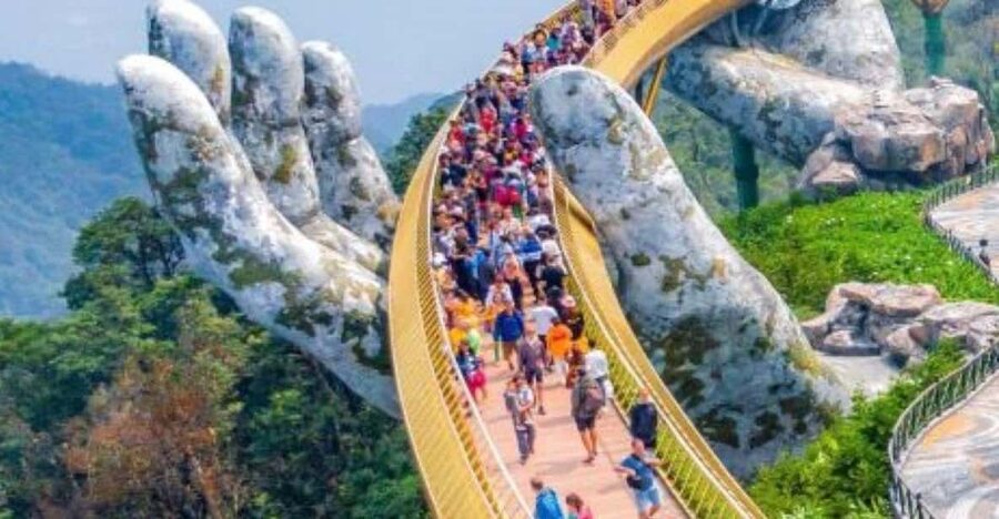 Private Car To BaNa Hills-Golden Bridge From Hoi An/Da Nang - French Village: street music, art stops, and carnival vibes